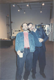 Men pose, circa 1990s.