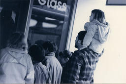 People watch glassblowing demonstration, circa 1992-1994.