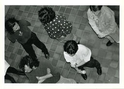 People on tiled floor, circa 1992-1994.
