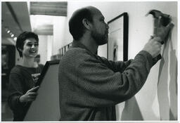 Man hammering, circa 1990s.