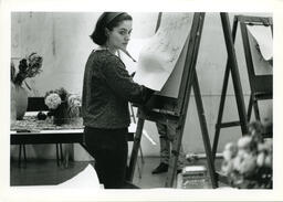 Woman with easel, circa 1992-1994.