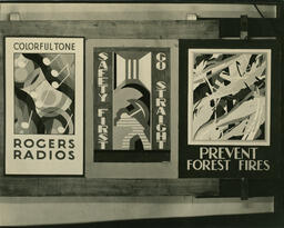 Three posters on wall, date unknown.