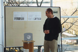 Man with display, circa 1990s.
