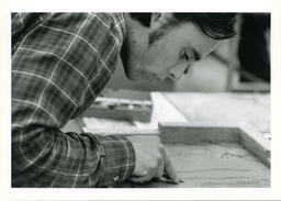 Man carving, circa 1992-1994.